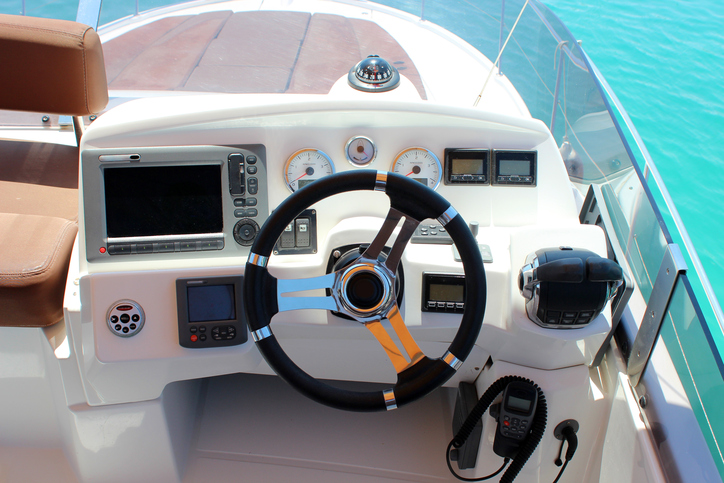 control panel and helm on motor yacht
